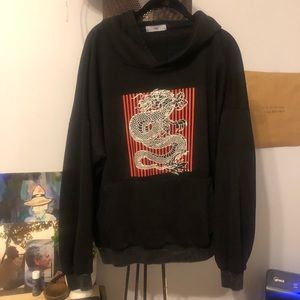 Graphic worn in hooded sweatshirt from Adika